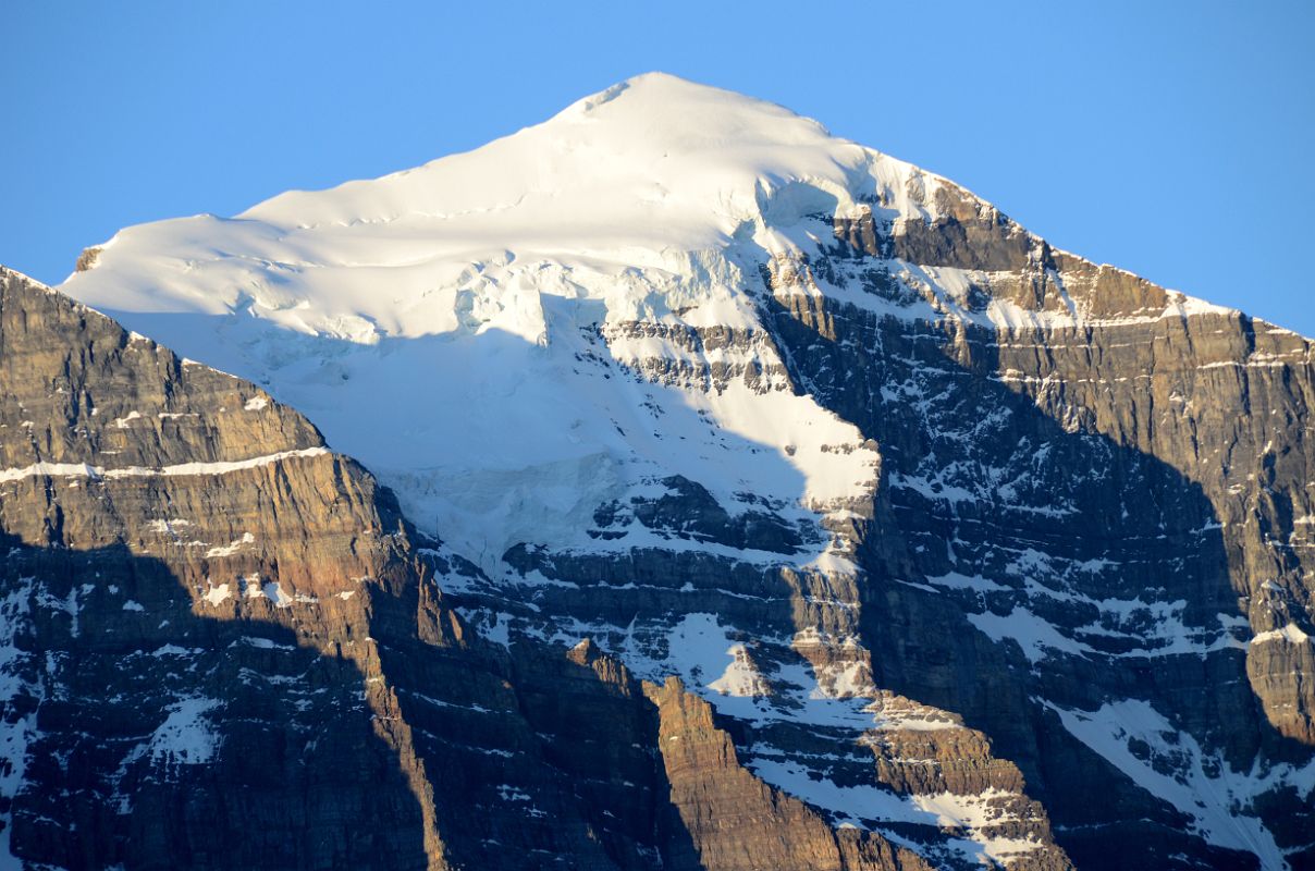 09 The Light Of Sunrise Quickly Changes To White On Mount Temple Close Up From Lake Louise Village